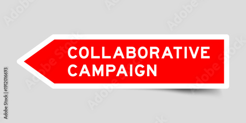 Red color arrow shape sticker label with word collaborative campaign on gray background