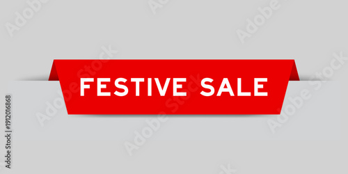 Red color inserted label with word festive sale on gray background