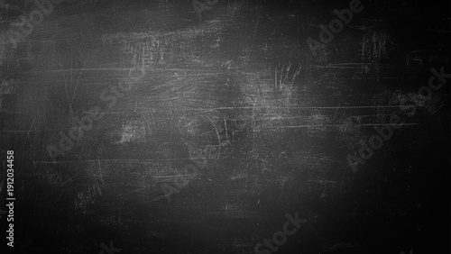 Elegant black background with vintage distressed grunge texture and dark gray charcoal color paint, black stone or concrete wall, black banner. Abstract design with textured black stone wall. Dark.