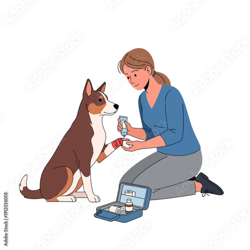 Woman applying bandage to injured dog's paw with first aid kit open on ground