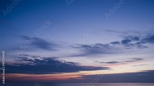 Serene Sunset over Calm Ocean Waters.