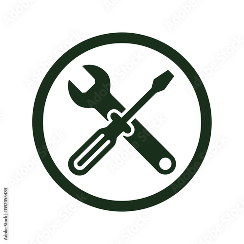A dark green circular icon depicting crossed wrench and screwdriver tools
