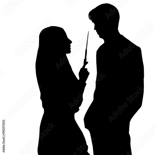 Silhouette of a Woman Holding a Knife Against a Man in Close Encounter
