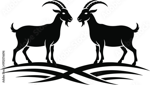 Black vector silhouette of two goats with horns facing each other on a decorative hill for farm branding livestock farming and animal agriculture