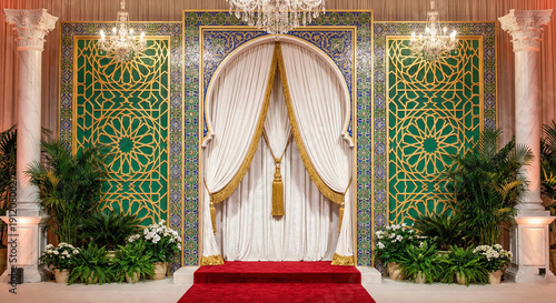 Luxurious Moroccan Wedding Stage Decor with Geometric Patterns Drapery and Floral Accents isolated on transparent background