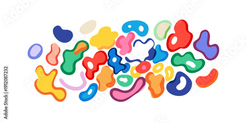 A vibrant assortment of colorful candy pieces scattered on a white background