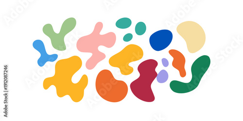 Assorted colorful puzzle pieces scattered on a white background