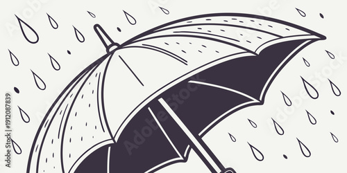 A black and white umbrella shielding from falling raindrops