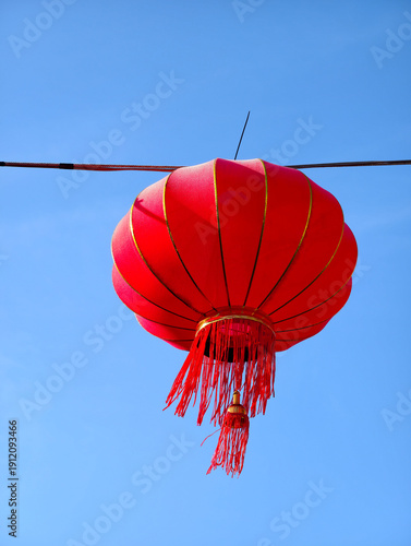 Red Chinese Lanterns Hanging Against Blue Sky for Lunar New Year Festival