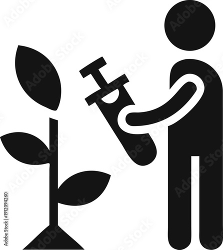 Gardener or Scientist Injecting a Plant with Treatment Solution or Nutrients