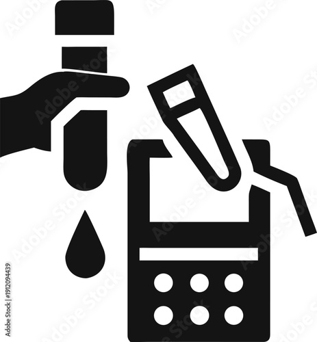 Hand holding a test tube with a dripping liquid over a medical analysis device