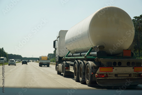 White Tanker Truck Moving Fast On Motorway