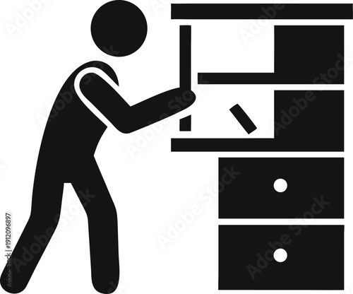 Professional installer assembling a wooden cabinet with multiple shelves and drawers