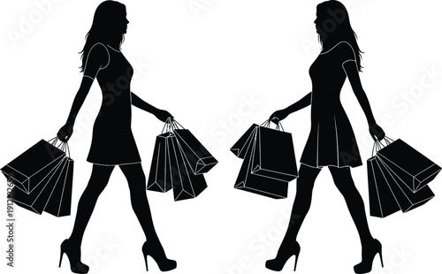 Two women carrying shopping bags silhouette