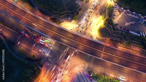 Wallpaper Mural Aerial City Intersection at Night with Heavy Traffic and Neon Lights Torontodigital.ca