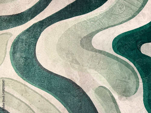 Canvas-taulu Close up of random curved and wavy carpet pattern in green tosca, celadon green, and white color