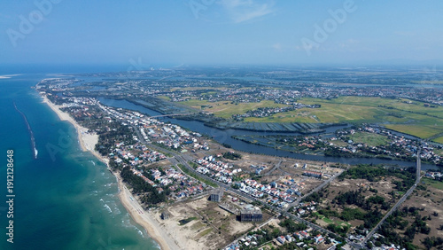 Schilderij op canvas Aerial panorama of the tropical coastline and emerald ocean at An Bang Beach in