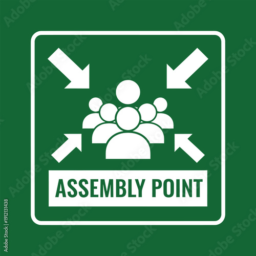 Green square sign with white border indicating an emergency assembly point, featuring a group of people icon and four inward-pointing arrows.