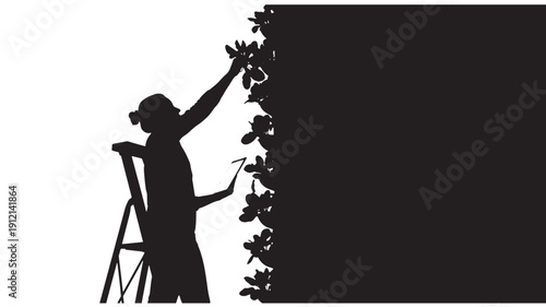 A gardener on a ladder trimming plants against a dark background, viewed from the side, showcasing the plants and gardening activity