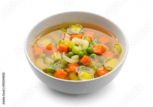 A bowl of vegetable soup with carrots and peas