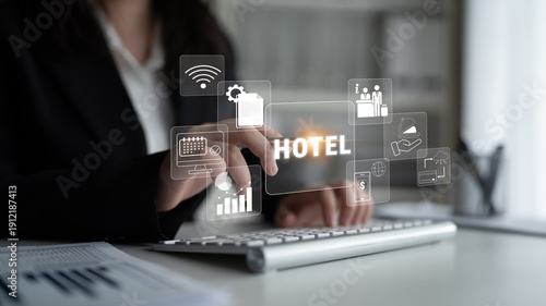 Billede på lærred Modern Technology Integration in Hotel Management with Digital Interface for Operations and Services Displayed on a Keyboard Quark