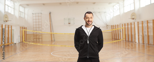 Fotografía PE teacher posing in a gymnasium
