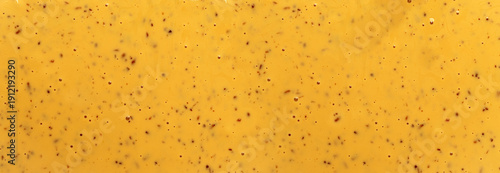 Foto Honey mustard sauce texture creating food background
