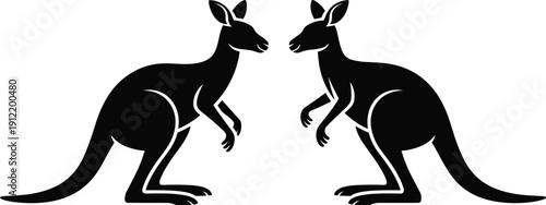 Black and white vector illustration of two kangaroo silhouettes facing each other in profile, Australian wildlife animal mascot logo for nature and travel branding