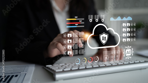Tableau sur toile A business professional engages with advanced digital cloud technology while using a keyboard, representing modern cybersecurity and data management solutions in a professional workspace
