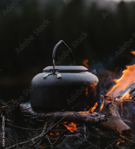 A coffee kettle on a camp fire