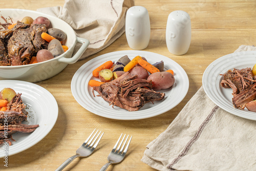 Fotografie Classic beef pot roast dinner with roasted vegetables