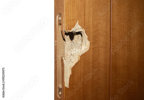 Damaged Wooden Door With Broken Lock Area and Hole From Forced Entry isolated on a white background
