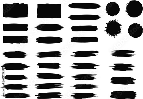 Collection of black brush stroke shapes and splatters on white background paint stroke ink stroke grunge