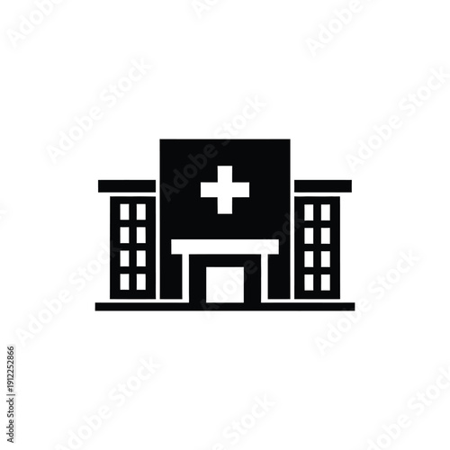 A simple black and white icon of a hospital building with a medical cross on the front