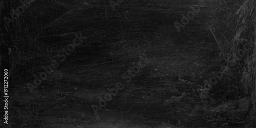 Dark gray chalkboard texture background, empty black slate stone surface with subtle chalk dust and weathered scratches