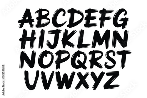 A stylized alphabet display with bold black brush script letters on white