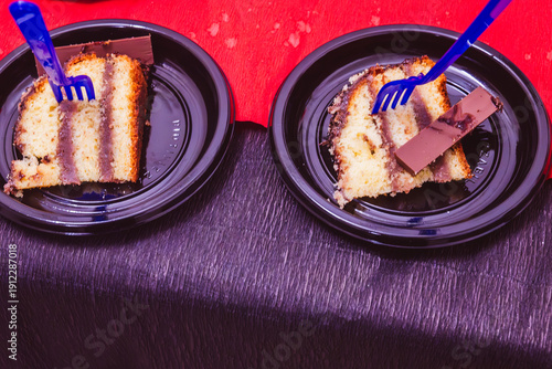 Wallpaper Mural Slices of birthday cake with forks on party table Torontodigital.ca