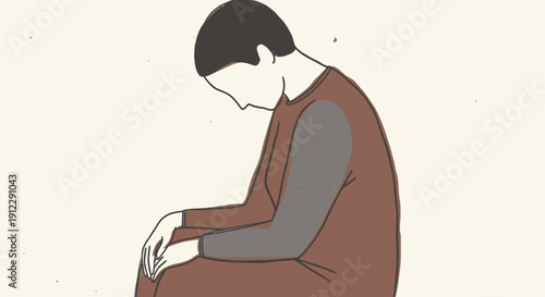 Depressed Person Sitting Alone Hunched Over Representing Sadness and Mental Health Issues