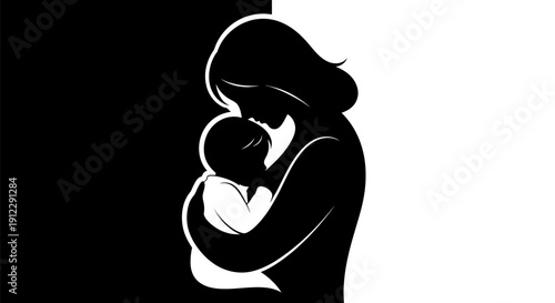 Mother holding newborn baby silhouette.