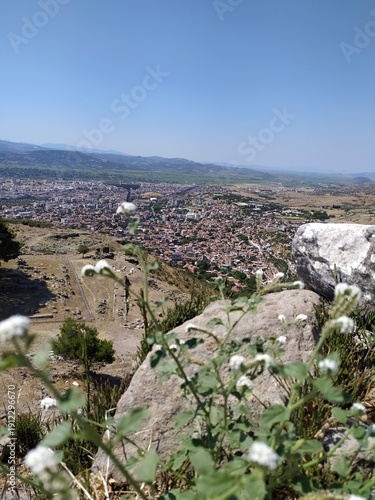 Sweeping valley panorama seen from the heights of the Pergamon acropolis.
The ancient ruins dominate the surrounding countryside and modern Bergama below.
This dramatic landscape reflects the strategi