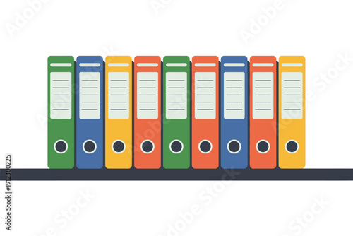 Multiple colored ring binders stand neatly organized upon a dark shelf surface.