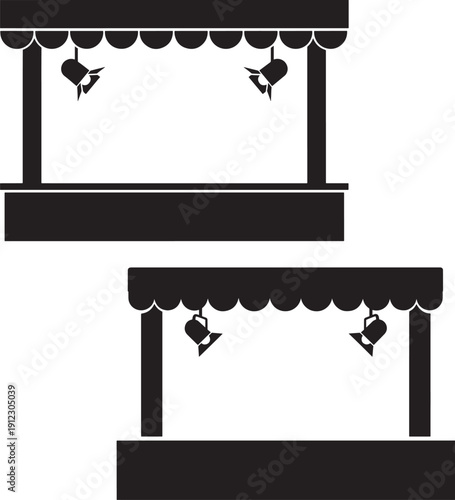 Carnival booth attraction with spotlights