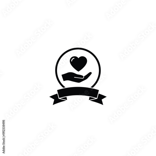 Hand holding heart inside circle with ribbon banner