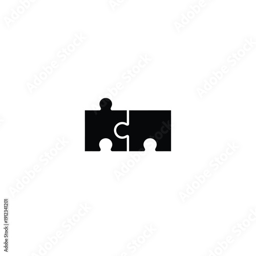 Two puzzle pieces connected together representing teamwork and problem solving