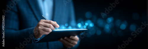 Businessman signing digital document on tablet