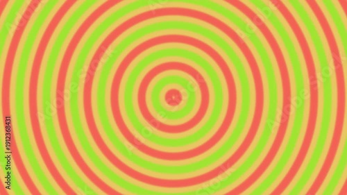 Hypnotic Red and Green Concentric Circles Expanding and Contracting Seamless Loop Background.
