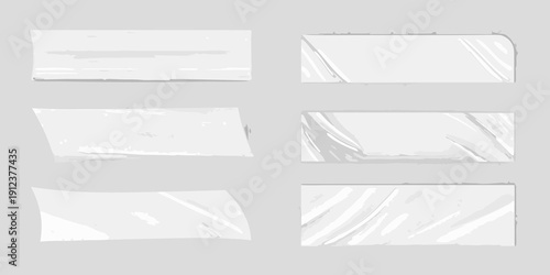 Collection of torn white paper pieces with varying shapes and textures