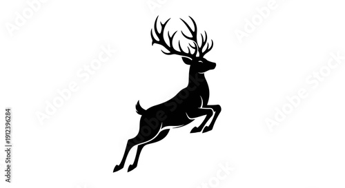 Silhouette of a majestic stag leaping with large antlers, isolated on white