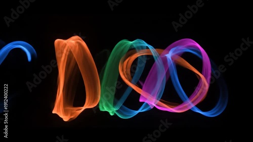 Abstract Swirling Light Trails in Blue and Orange Creating Infinity Loop Shapes Against Black Background