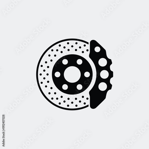 A black and white illustration of a vehicle brake disc and caliper